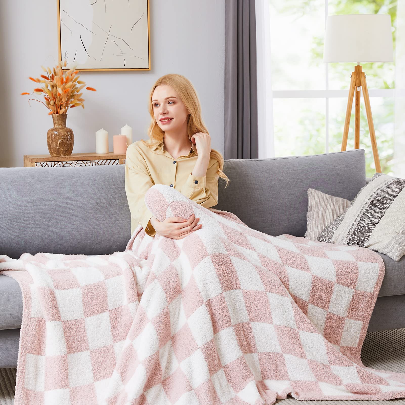 WRENSONGE throw draped on couch adding style and comfortable layering