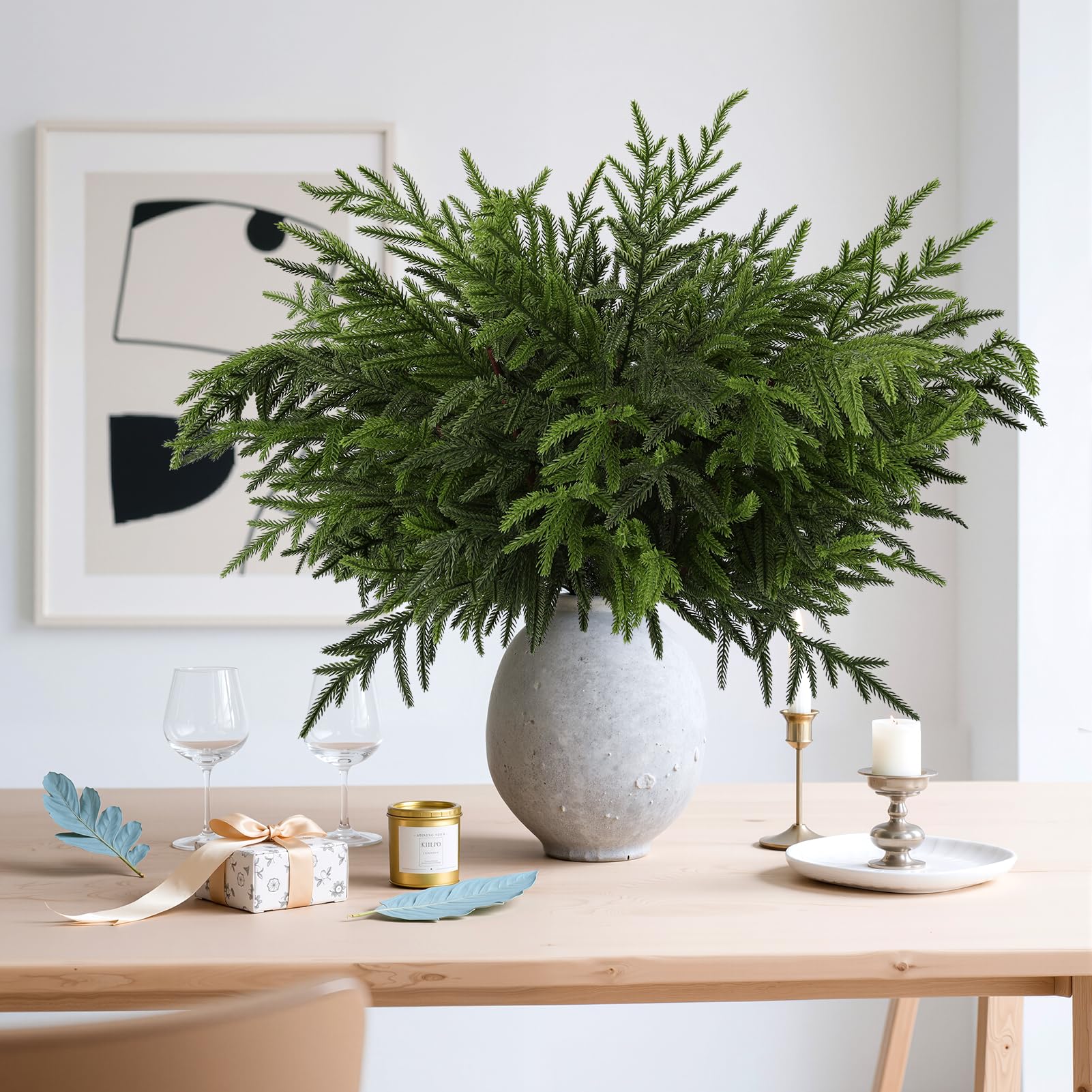 Wsorik branches styled in a tall vase adding instant entryway greenery and height