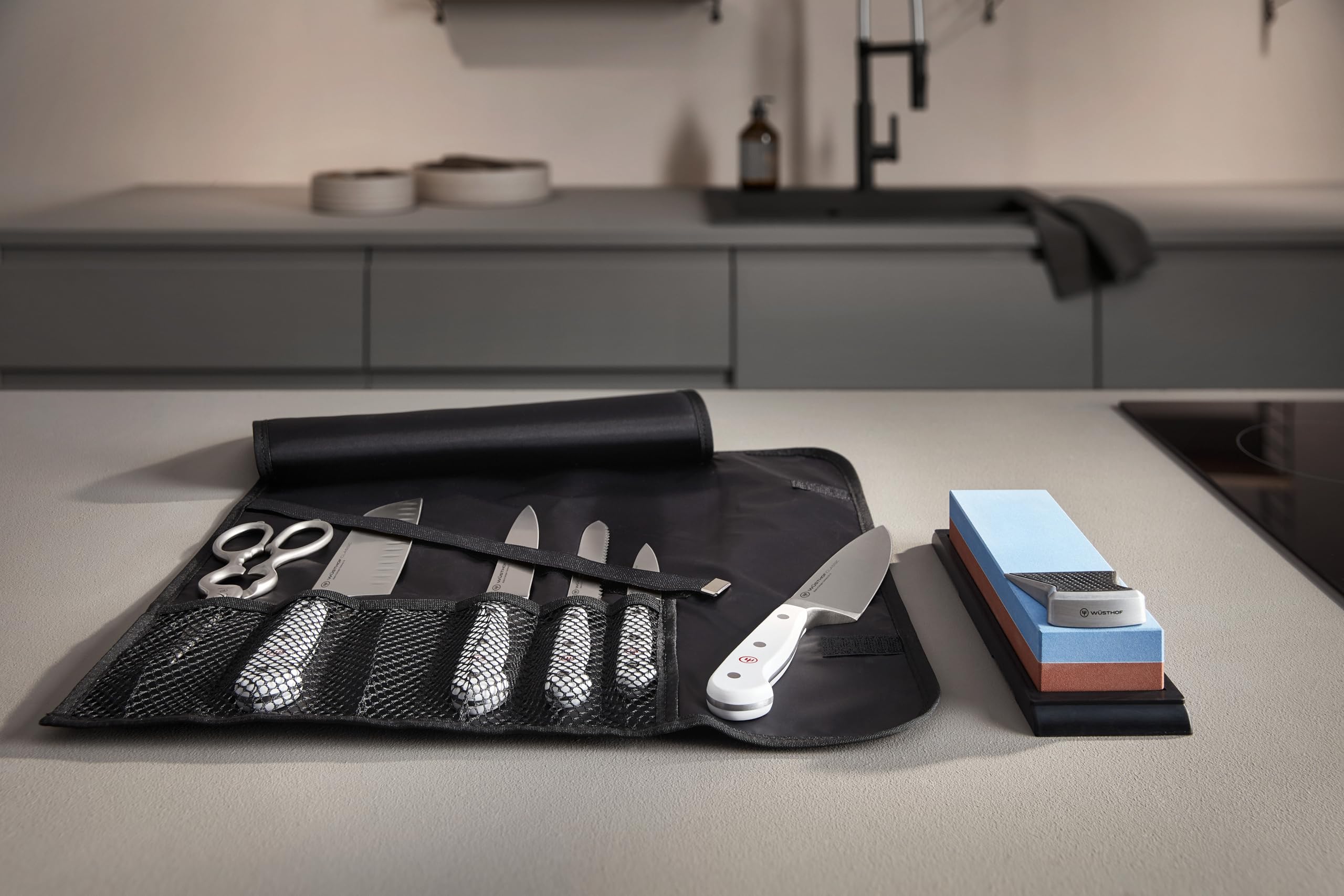 Wüsthof shears held in hand for scale demonstrating comfortable ergonomic fit