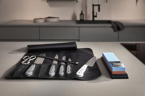 Wüsthof shears held in hand for scale demonstrating comfortable ergonomic fit