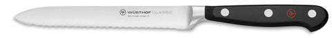 Wüsthof Classic 5" serrated utility knife front profile showing balanced design and versatile use