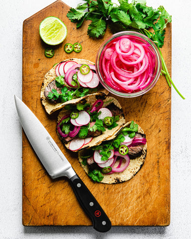 Wüsthof knife on a kitchen counter in lifestyle setting conveying everyday reliability
