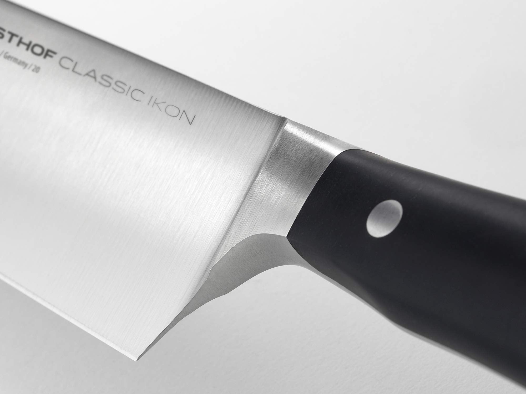 Wüsthof Classic Ikon blade closeup showing forged edge and long-lasting sharpness