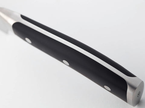 Wüsthof Classic Ikon handle detail highlighting ergonomic grip benefit