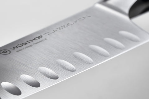 Wüsthof Classic IKON close-up of forged blade edge highlighting sharp PEtec finish and durability