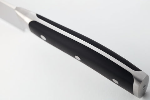 Wüsthof Classic IKON ergonomic black handle detail showing comfortable grip for long prep sessions