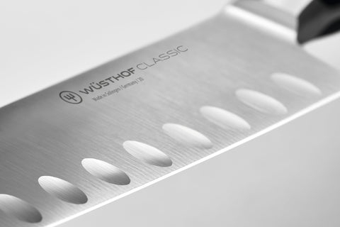 Wüsthof Classic Santoku blade close-up highlighting fine edge for precise cuts