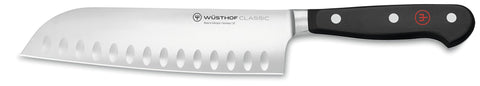 Wüsthof Classic Santoku front view showing balanced profile and sharpness benefit