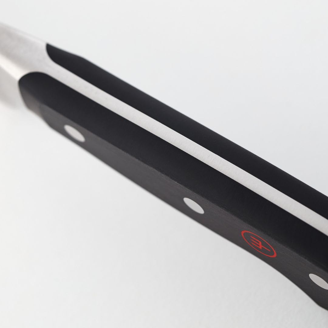 Wüsthof cleaver handle close-up showing square handle for secure ergonomic grip
