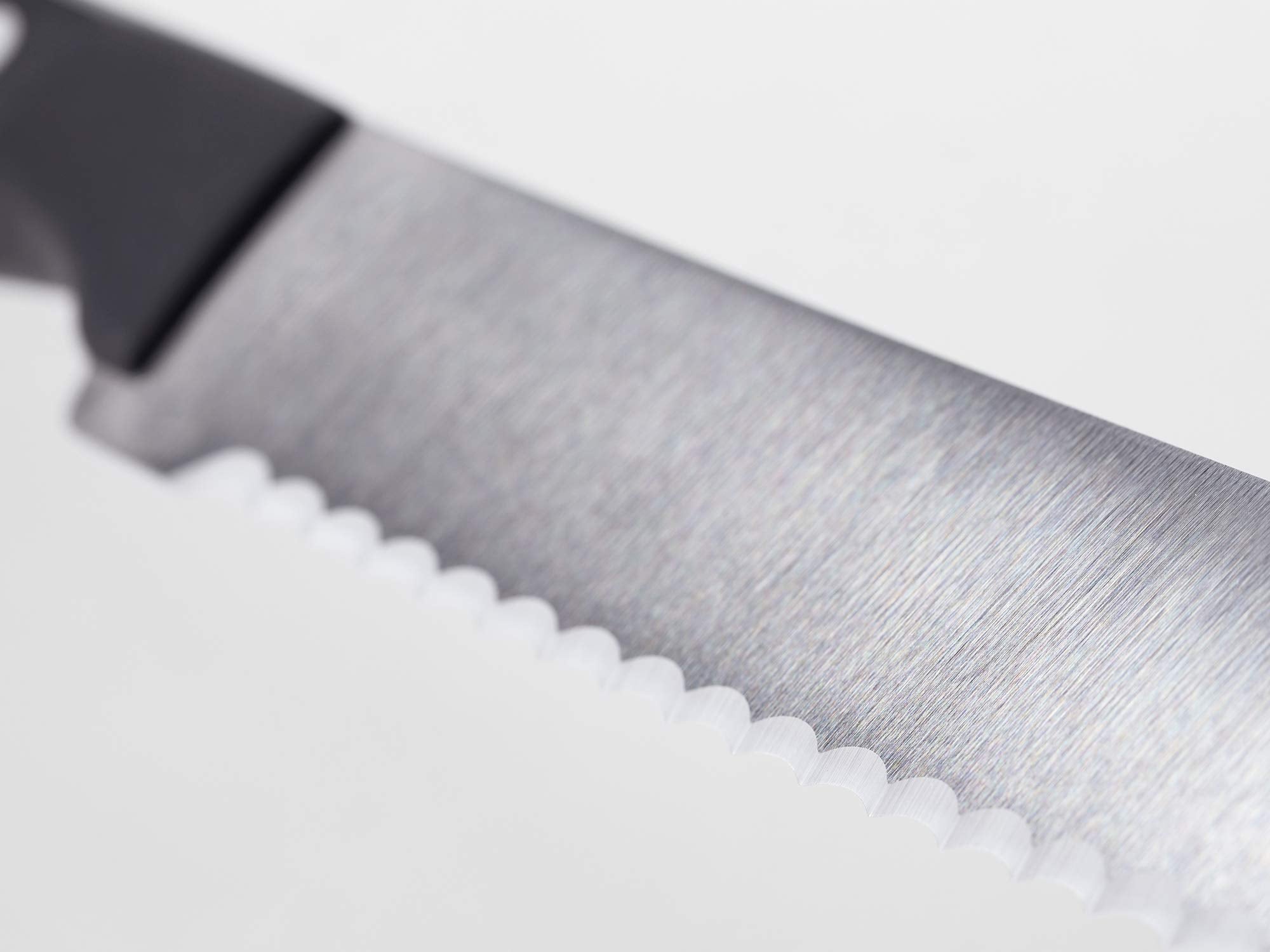 Wüsthof closeup of black polypropylene handle offering heat-resistant secure grip