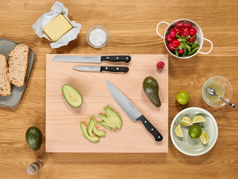 Wüsthof kitchen shears and paring knife displayed for versatile cutting tasks