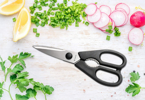 Wüsthof kitchen shears and honing steel displayed together for maintenance and utility
