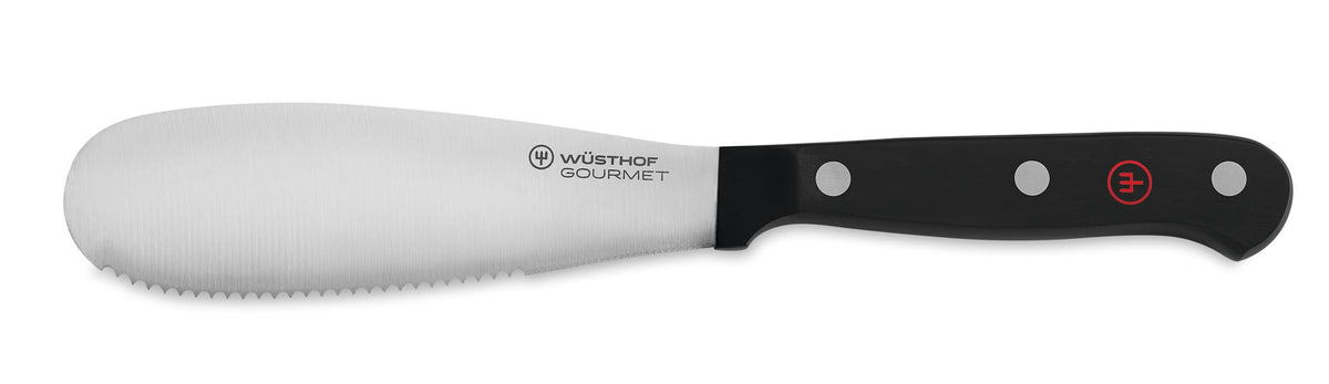 Wüsthof spreader front view showing compact blade and black handle for precise spreading