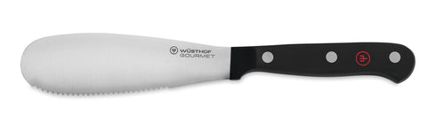 Wüsthof spreader front view showing compact blade and black handle for precise spreading