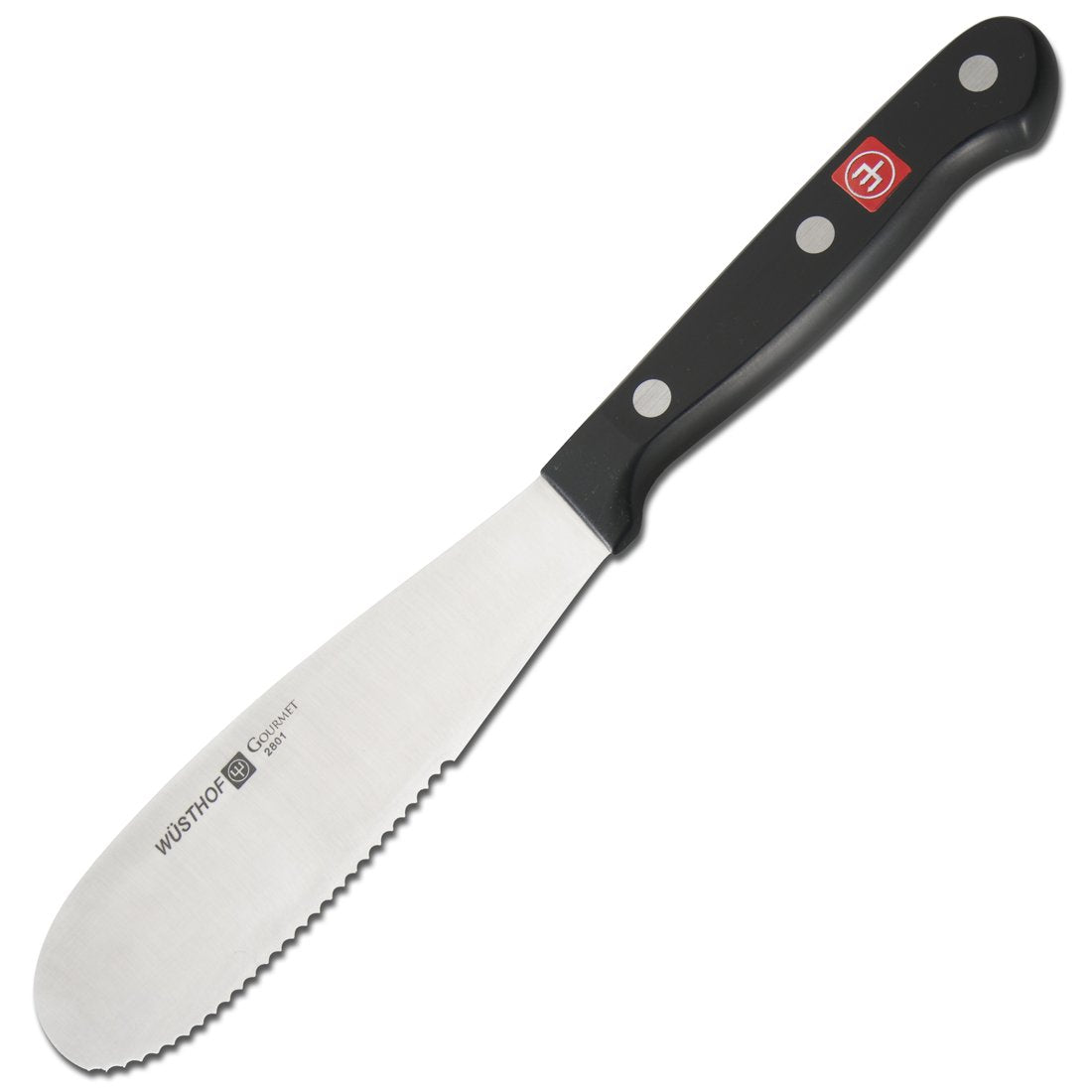 Wüsthof spreader beside cutting board to show 5-inch scale and everyday kitchen fit
