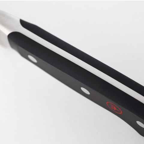 Wüsthof knives beside a ruler for scale and compact table-ready size