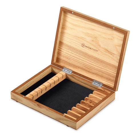 Wüsthof knife in hand slicing steak smoothly for effortless table service