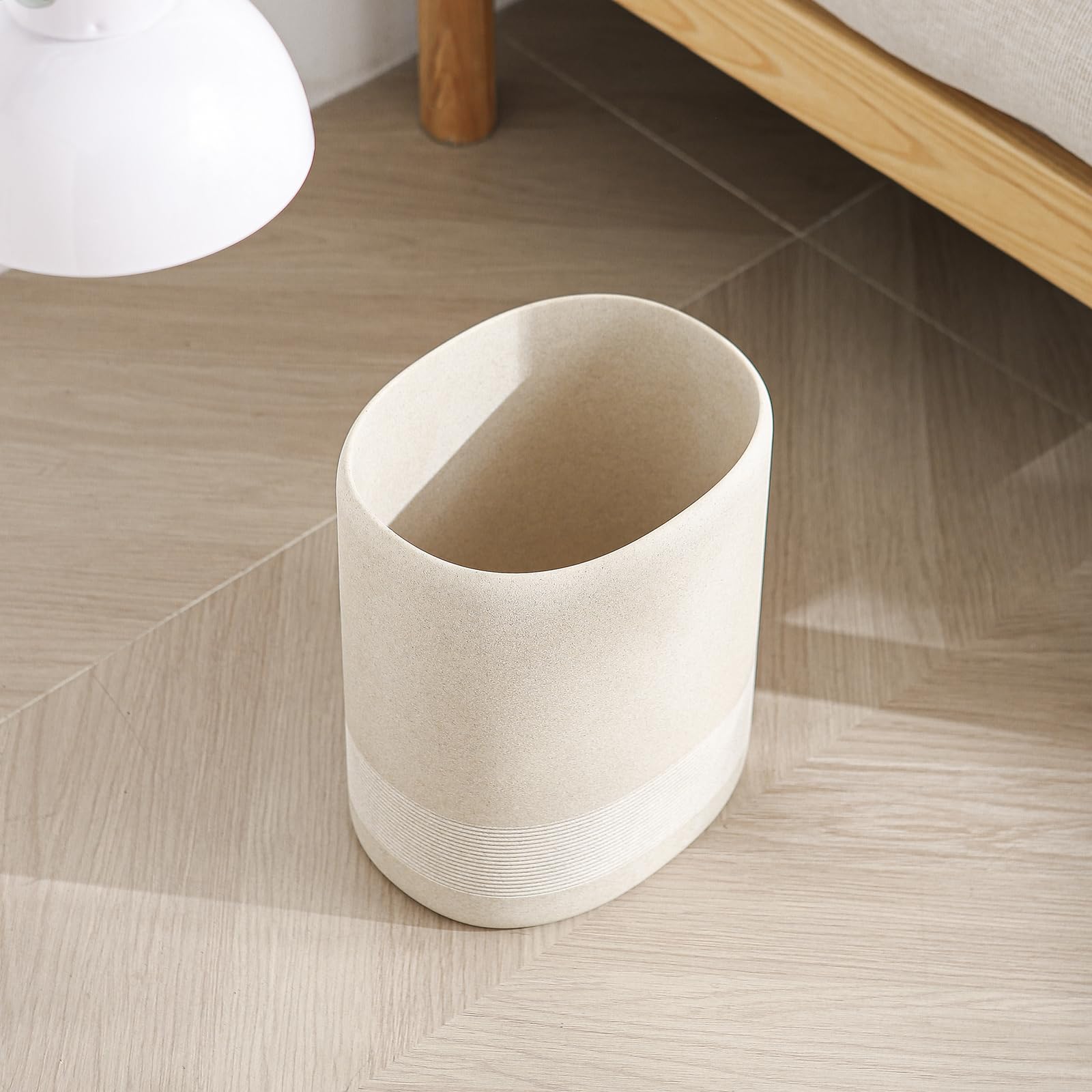 WUUAHOME side profile showing narrow oval footprint for tight corners and efficient placement