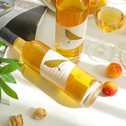 WUWEOT pouring from a bottle into glass highlighting spill-free pour benefit