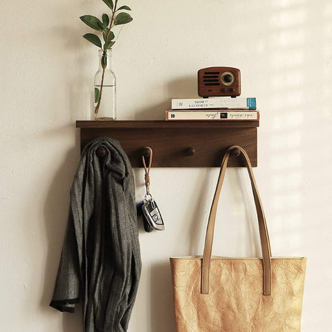 XAOMLP walnut front view showing hooks and shelf, adds tidy organization