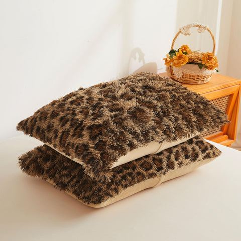 XeGe cheetah styled bedroom shows cozy, fashionable bedding setup