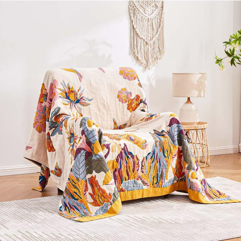 XIBLC throw folded detail highlighting neat edges and soft cotton feel