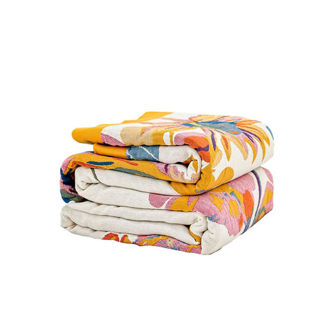 XIBLC throw front draped showing boho floral design and cozy appeal