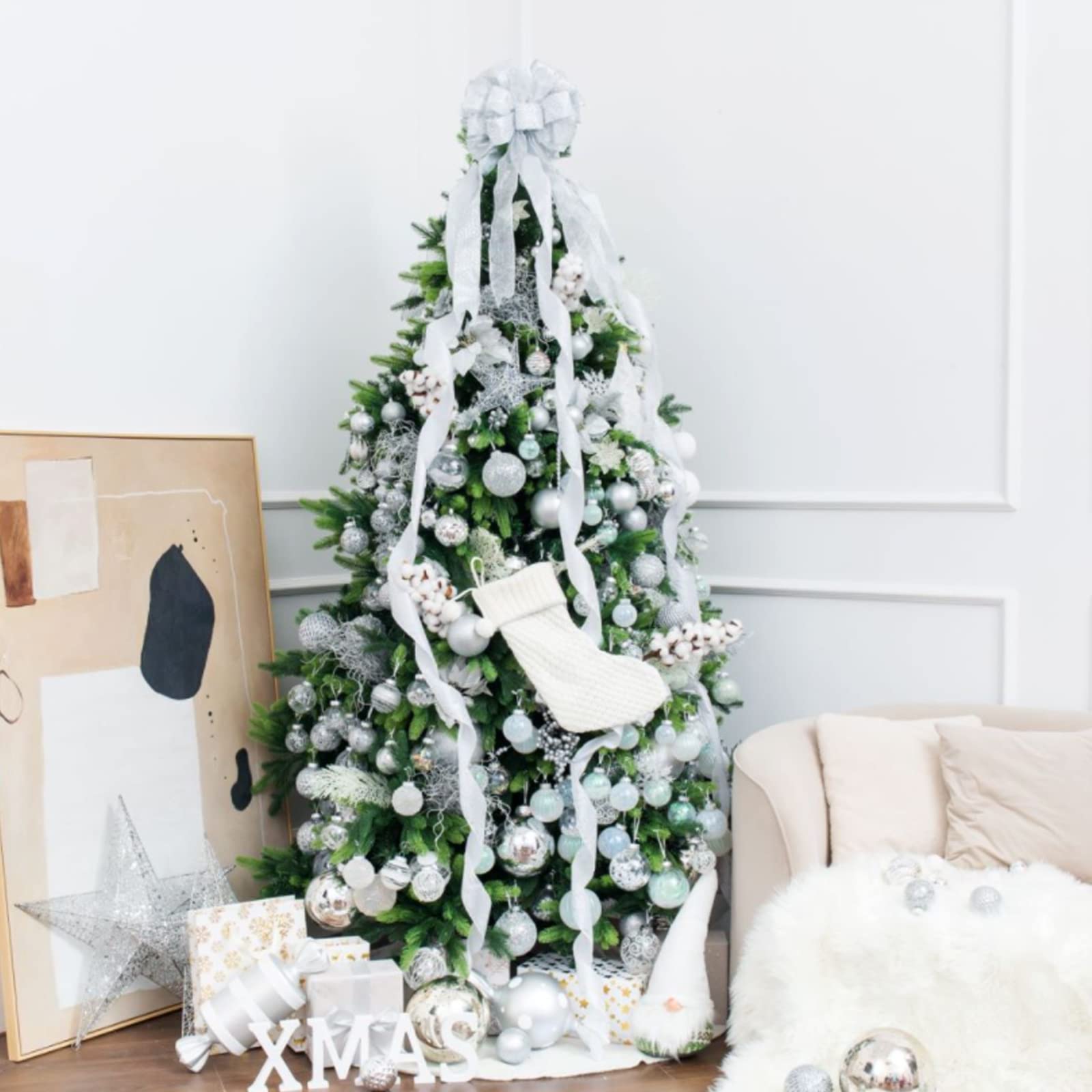 XmasExp ornaments arranged on mantle offering cohesive holiday styling