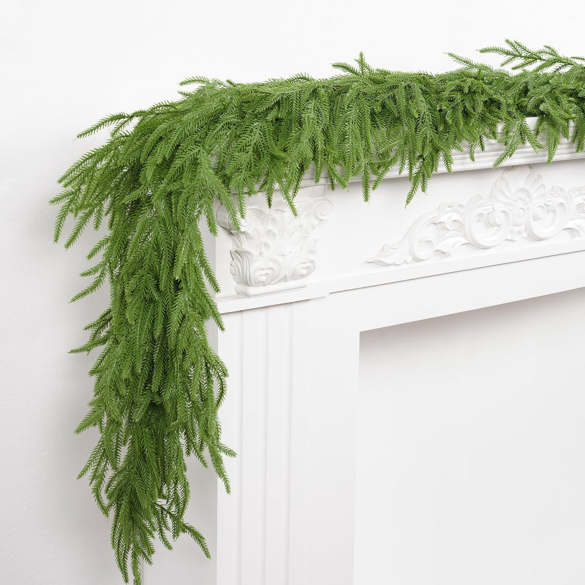 XmasExp garland front view showing full, lifelike green coverage and easy styling