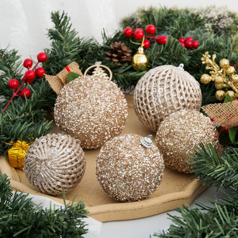 XmasExp ornament on garland centerpiece creating cohesive, reusable table styling