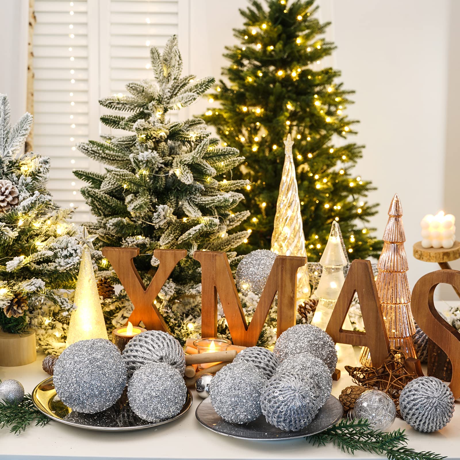 XmasExp ornament placed in a wreath adding festive shimmer to decor