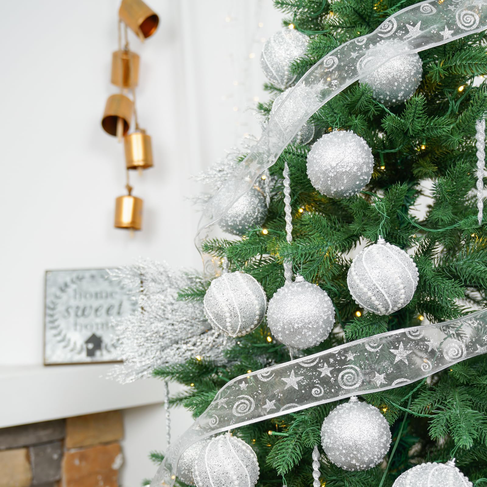 XmasExp ornament held in hand demonstrating 3.15-inch size and lightweight benefit