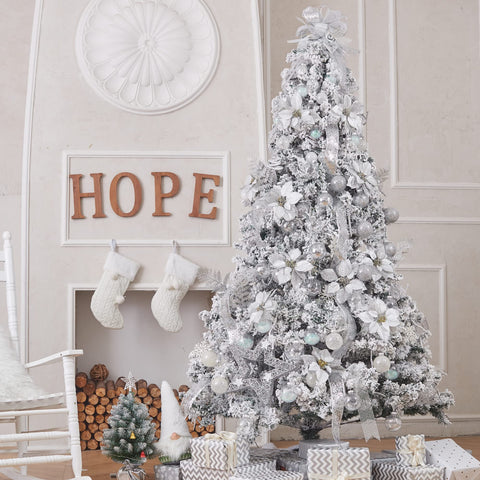 XmasExp ornament beside hand showing scale and lightweight handling