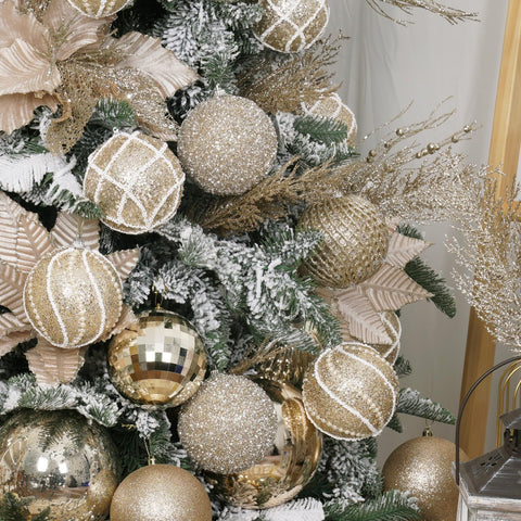 XmasExp ornaments on lit tree creating warm sparkle and full appearance