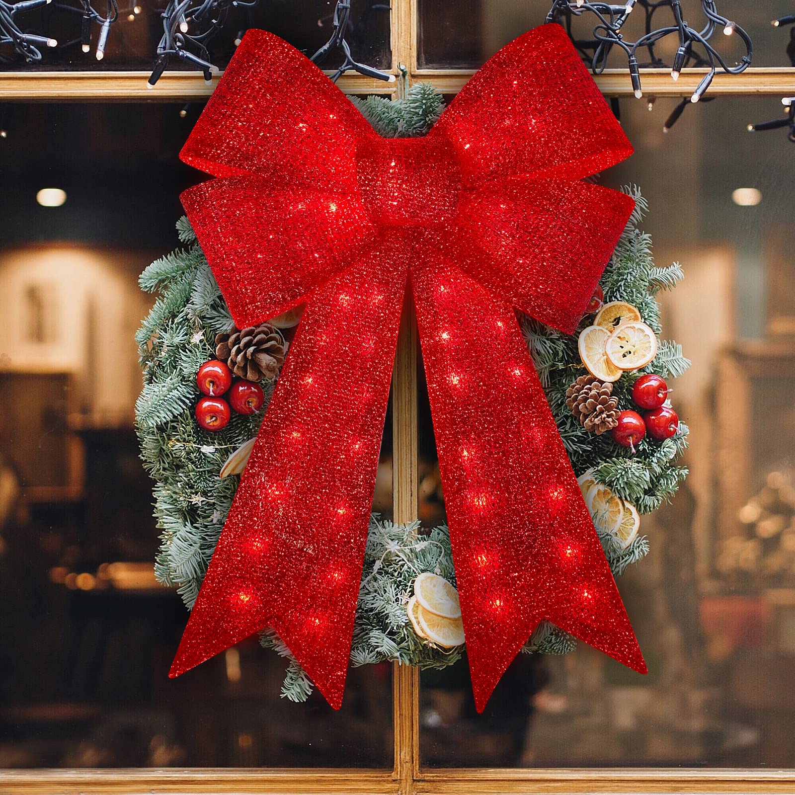 Xmasnova bow mounted on tree creating a festive focal point