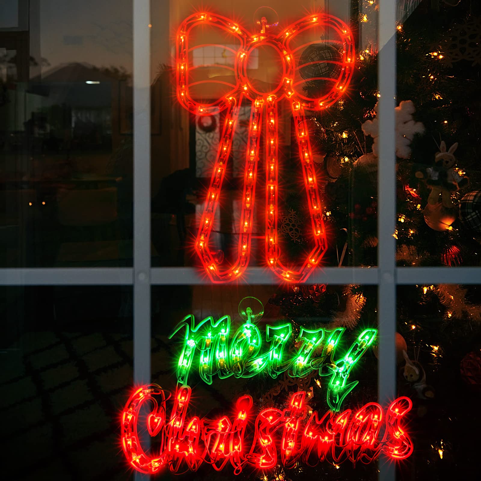 Xmasnova front view of bow and Merry Christmas sign showing festive glow for windows