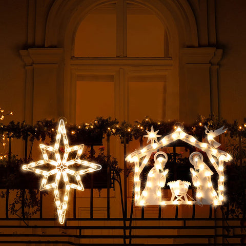 Xmasnova window at night with silhouettes visible from street