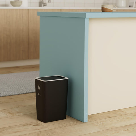 XPIY close-up of the press-to-open button for quick hygienic disposal