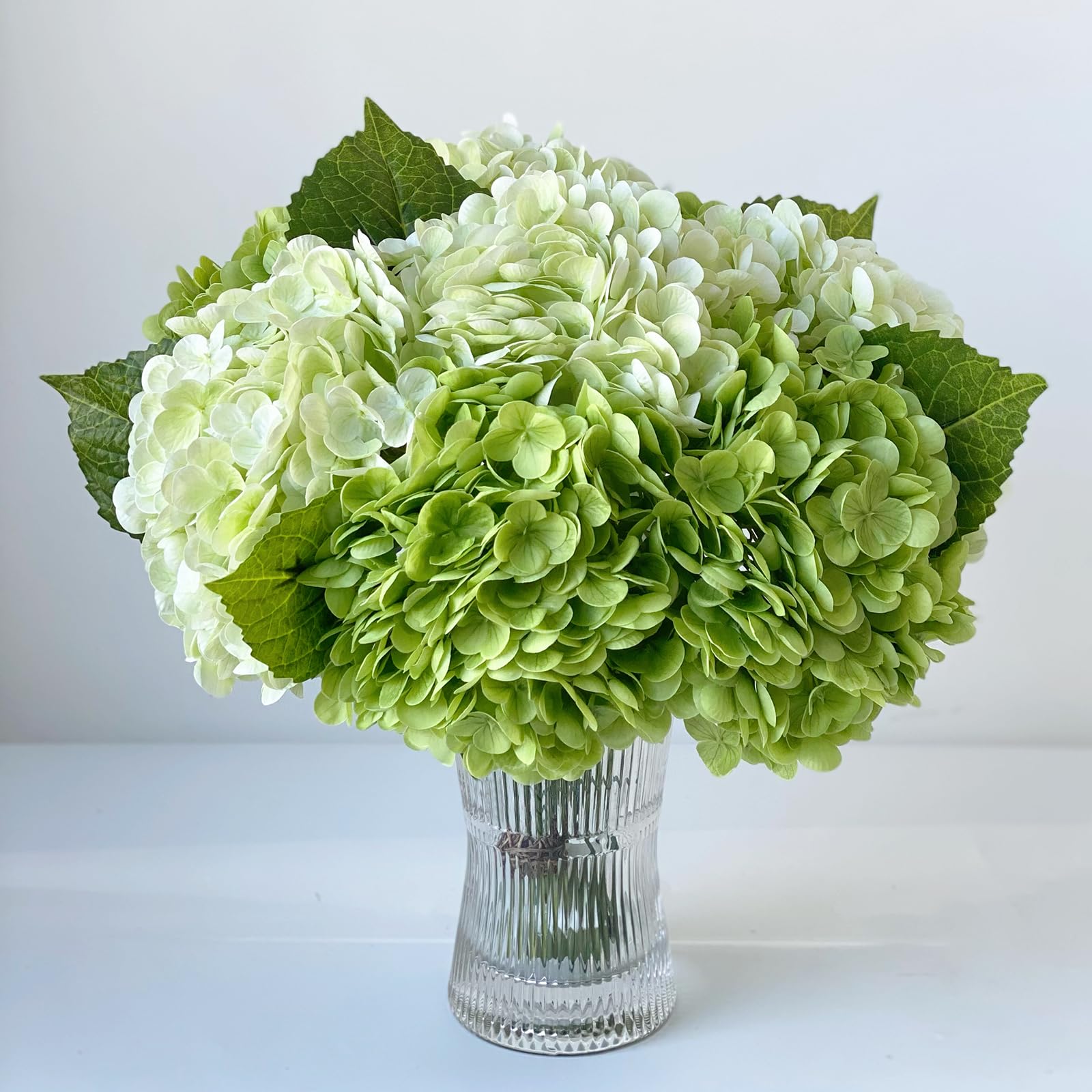 YalzoneMet displayed on patio table adding long-lasting greenery outdoors