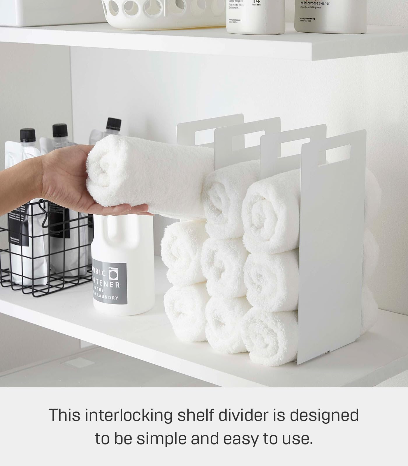 YAMAZAKI tower placed on bathroom shelf demonstrating space-saving storage
