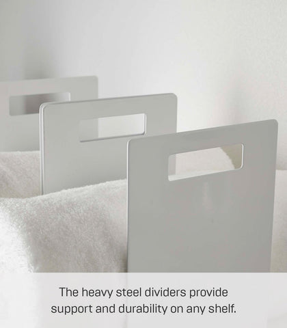 YAMAZAKI tower next to ruler showing compact dimensions and shelf fit