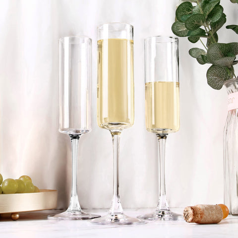 YANGNAY champagne flutes in use during a toast showcasing clarity and celebratory sparkle