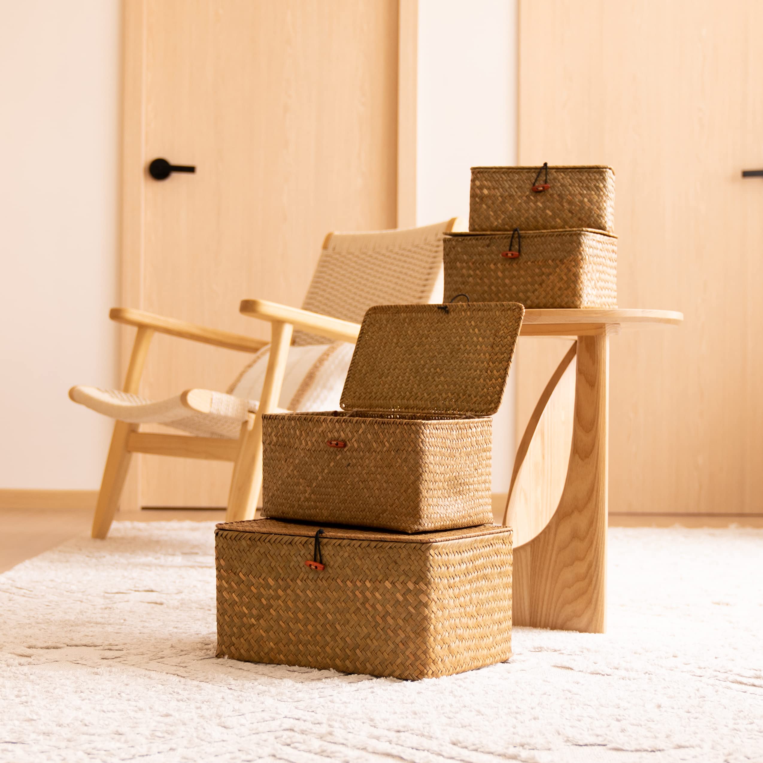 YANGQIHOME basket holding towels showing bathroom storage convenience