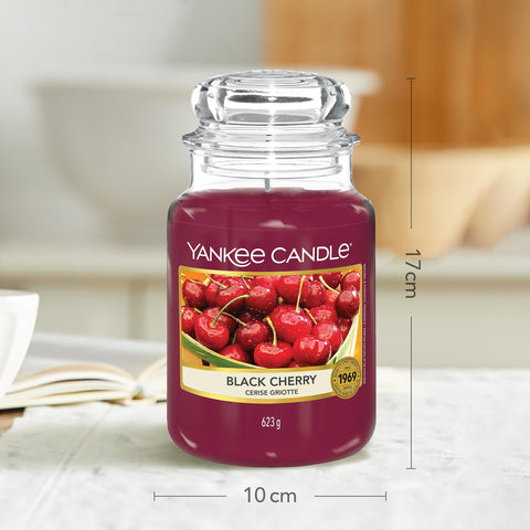 Yankee Candle black cherry in living room setting creates warm fragrant atmosphere