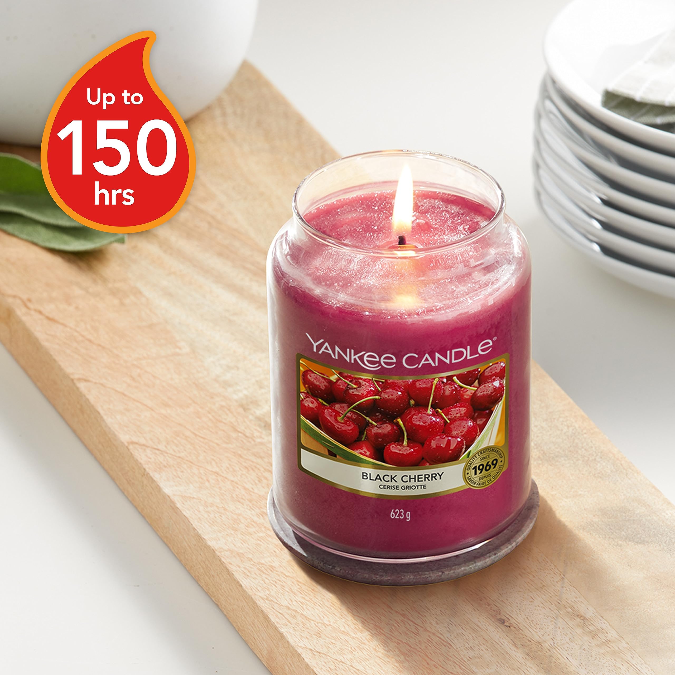 Yankee Candle black cherry single wick detail shows hand-straightened wick for even burn
