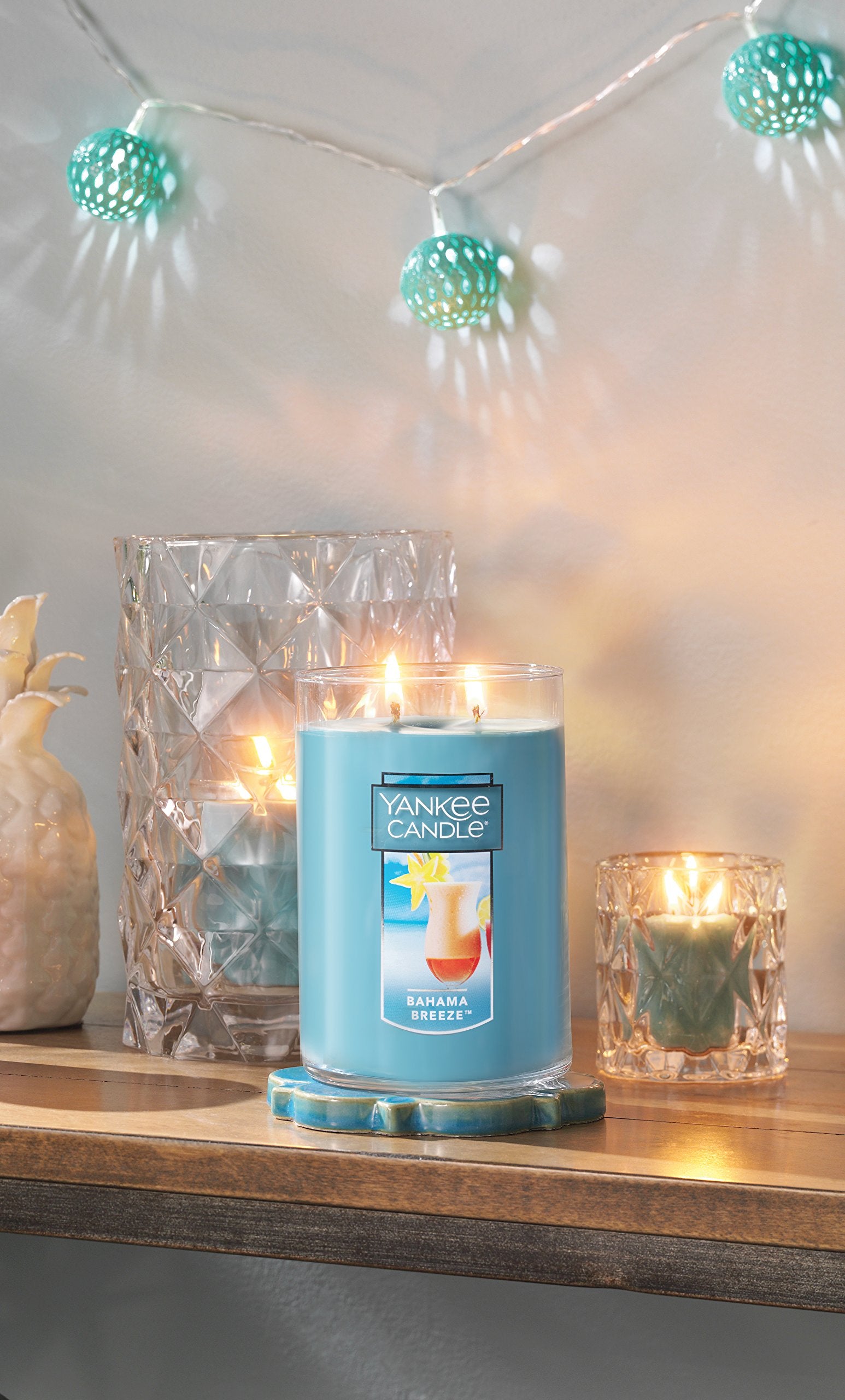 Yankee Candle Bahama Breeze on mantel styled to create island-like ambiance