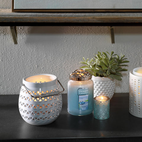 Yankee Candle on bathroom shelf adding spa-like Beach Walk aroma