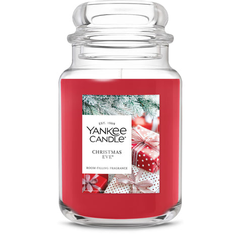 Yankee Candle front view showing jar and festive fragrance benefits
