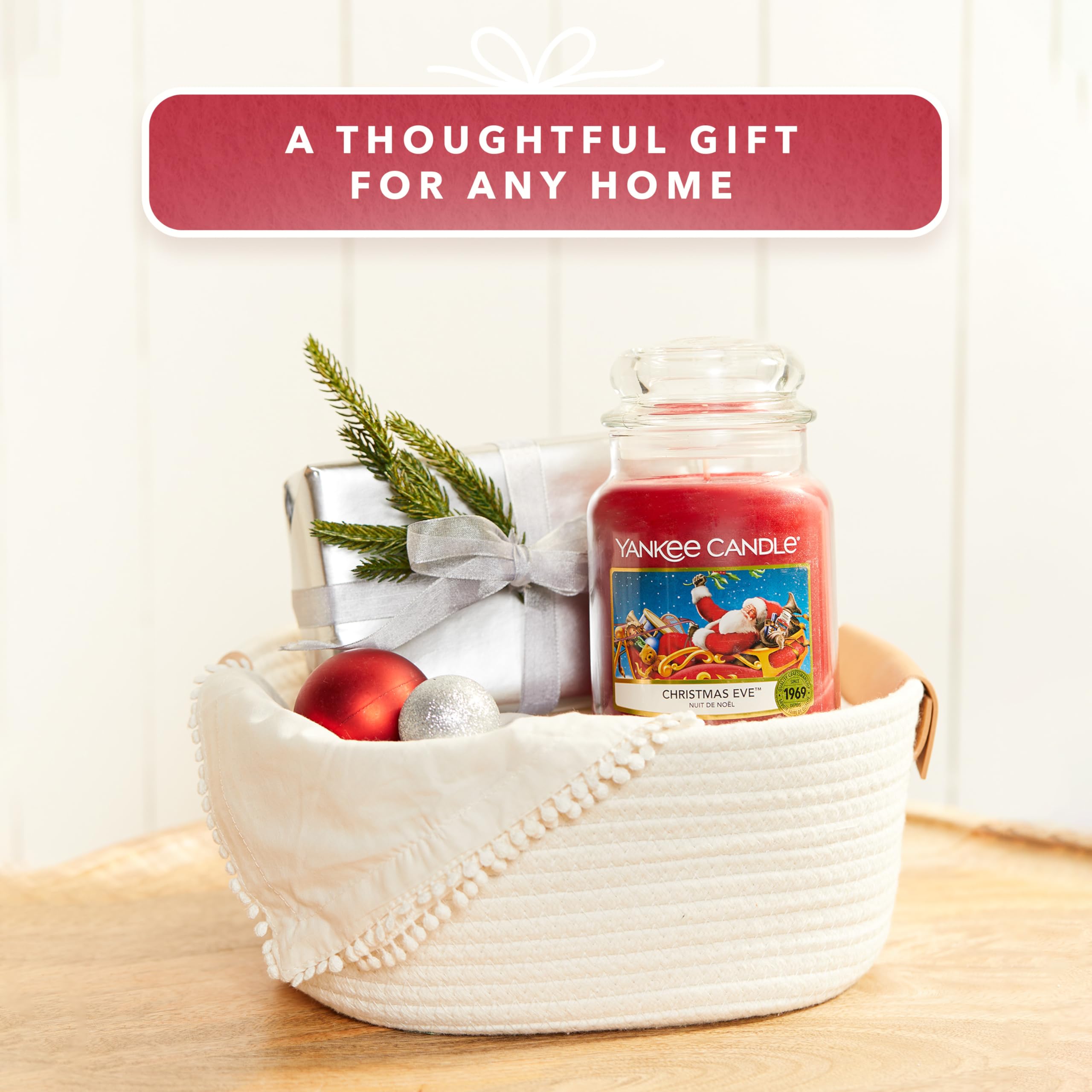 Yankee Candle on a mantel lifestyle shot creating cozy holiday atmosphere in living room