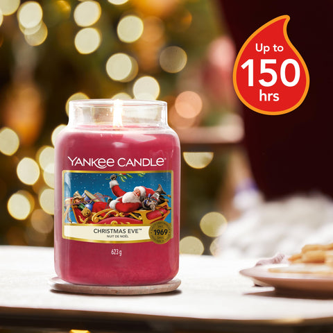 Yankee Candle wick and wax close-up showing hand-centered wick for even burn